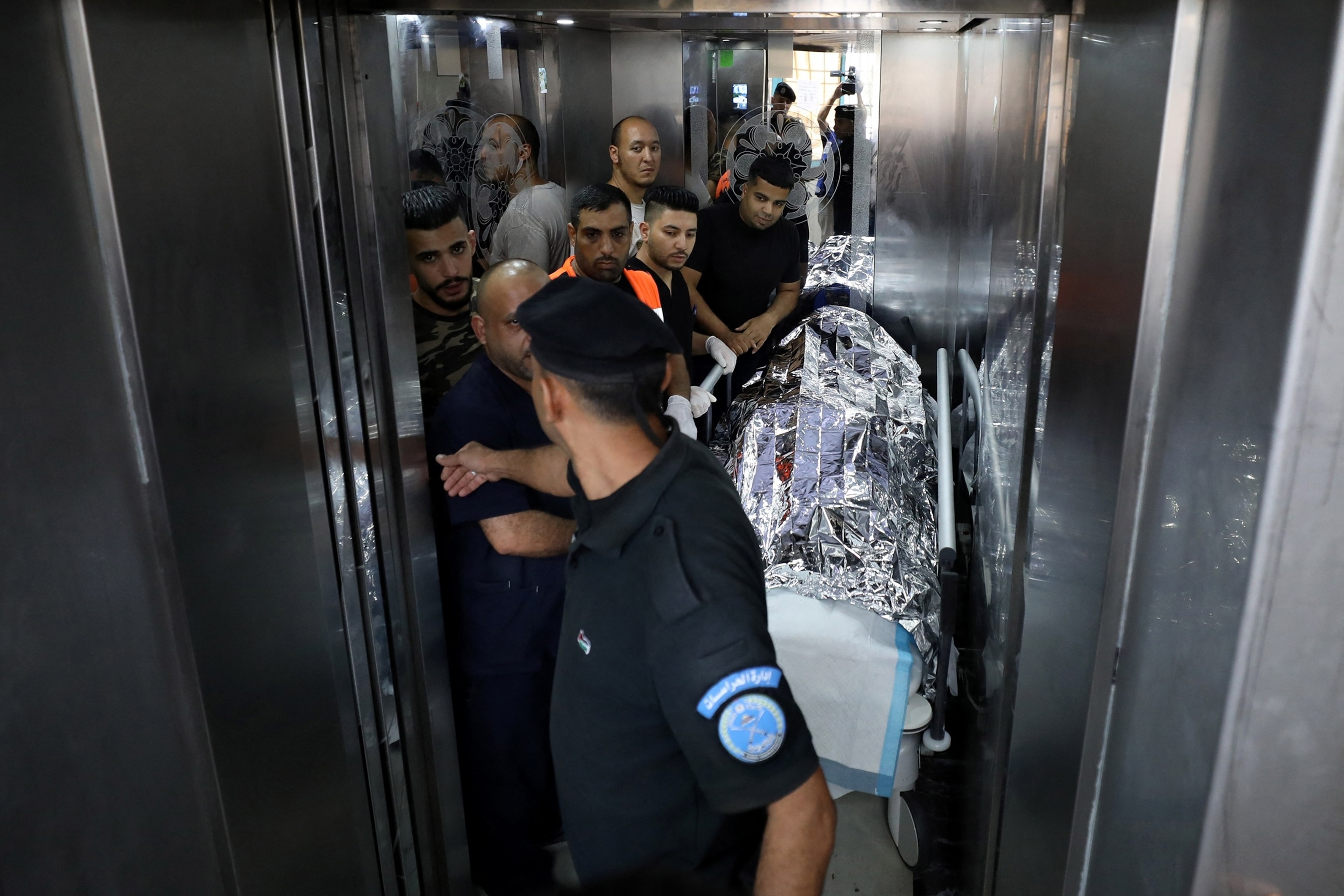 PHOTO: Medics transport the body of a U.S. citizen after she succumbed to her wound from a reported gunshot, at a hospital in Nablus in the occupied West Bank on Sept. 6, 2024.